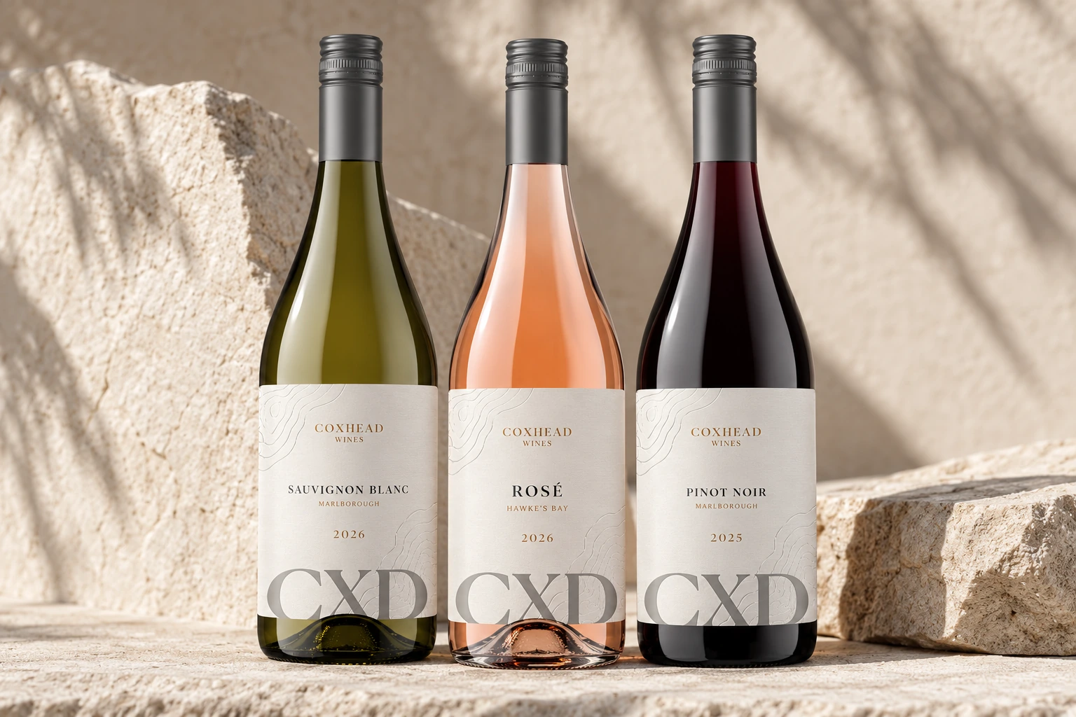 Coxhead Wines Sauvignon Blanc 2026, Hawke's Bay Rosé 2026 and Marlborough Pinot Noir 2025 on stone